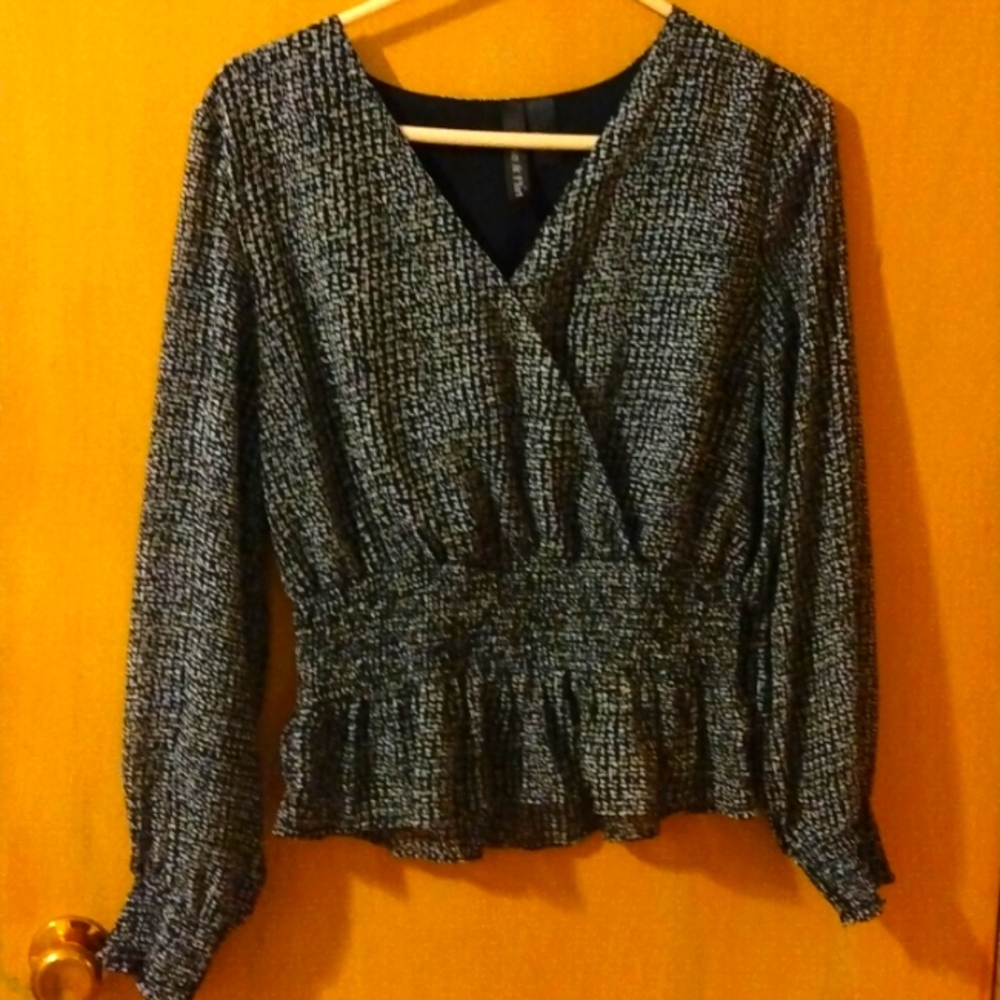 A ruffled black and white top!